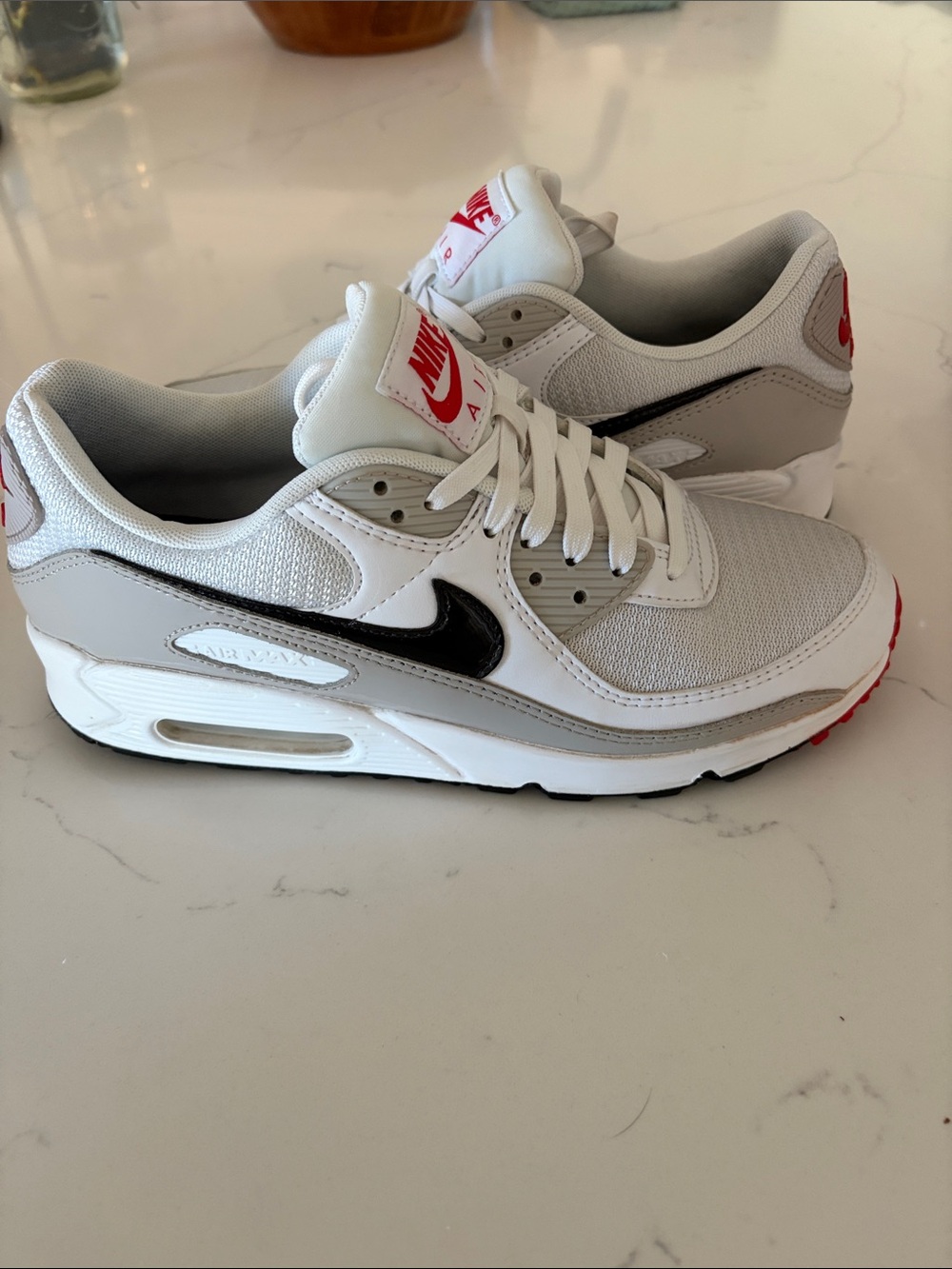 Nike Women’s Air Max 90 Light Iron White/Grey with Black Swoosh and Red Accents